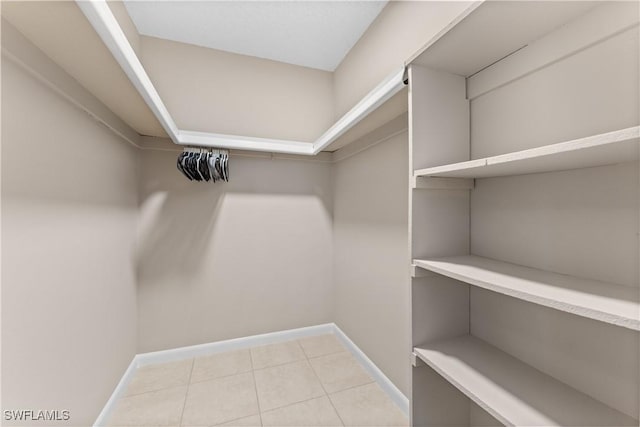 walk in closet featuring light tile patterned floors