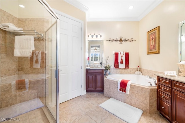 bathroom with tile patterned flooring, vanity, shower with separate bathtub, and crown molding