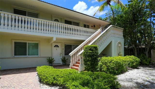 property entrance with a balcony