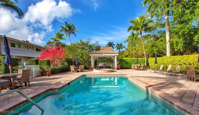 view of pool with a gazebo and a patio area