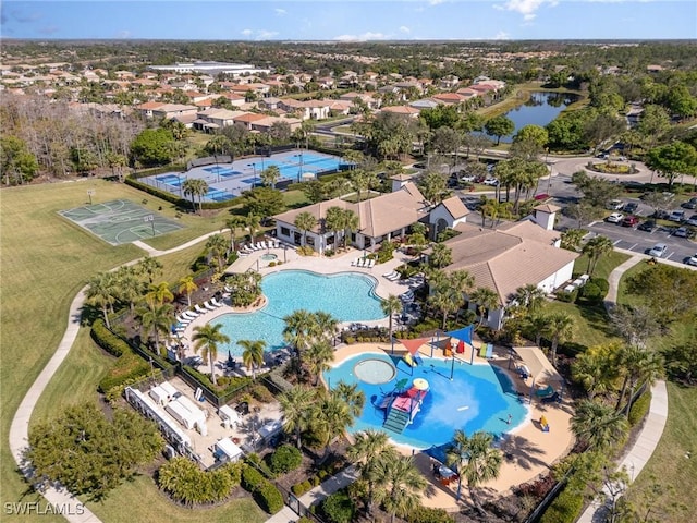 drone / aerial view with a water view