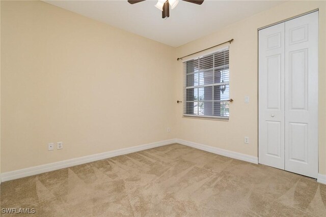 10188 Mimosa Silk Dr, Fort Myers, FL 33913 - unfurnished bedroom featuring baseboards and carpet flooring