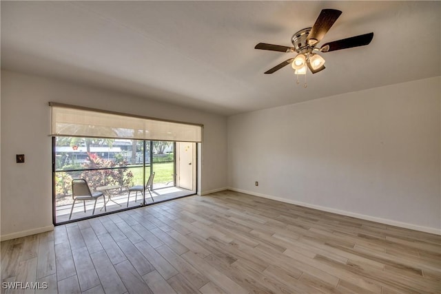 unfurnished room featuring ceiling fan and light hardwood / wood-style floors