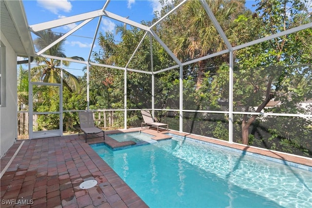 4320 Little Hickory Rd, Bonita Springs, FL 34134 - view of pool with a patio area, glass enclosure, and a jacuzzi