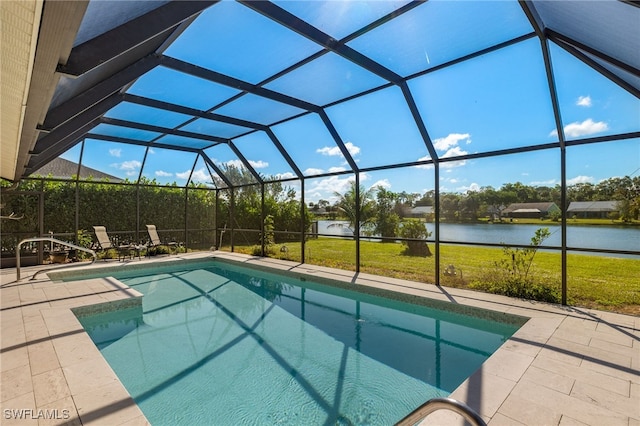 view of pool with a water view, a lanai, a patio area, and a lawn