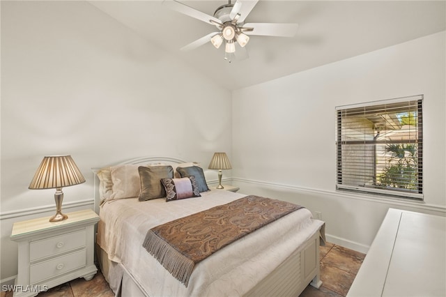 bedroom with vaulted ceiling and ceiling fan