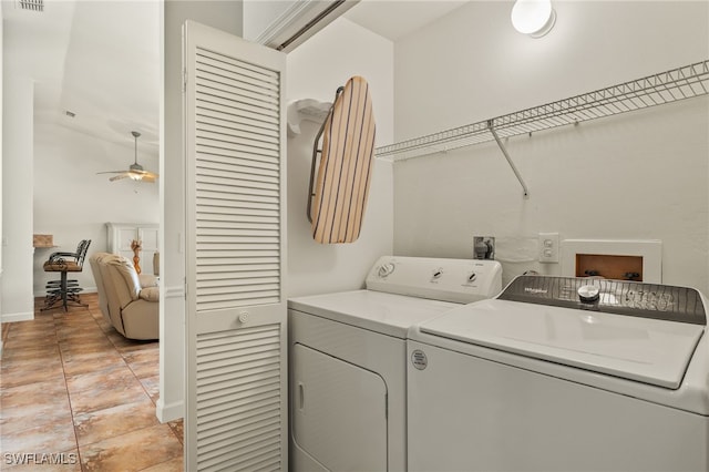 washroom with separate washer and dryer, light tile patterned floors, and ceiling fan