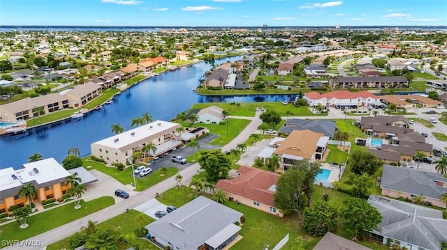 bird's eye view with a water view