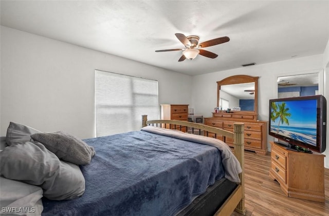 bedroom featuring ceiling fan and light wood-type flooring