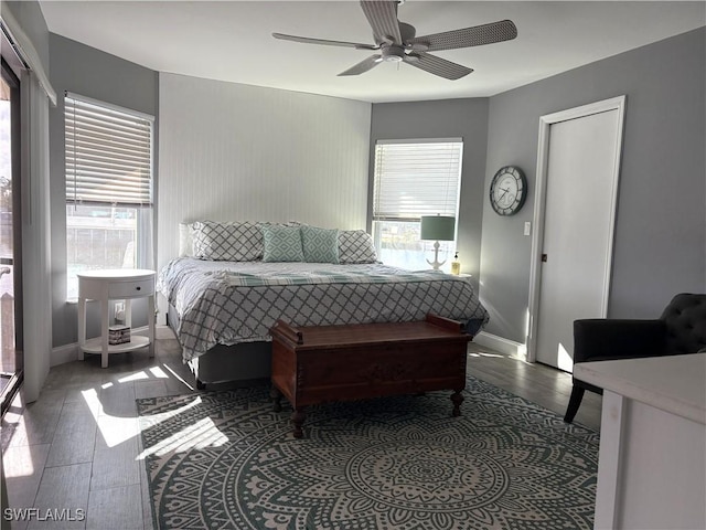 bedroom featuring hardwood / wood-style floors and ceiling fan