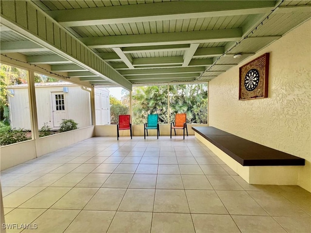 view of patio / terrace with an outbuilding