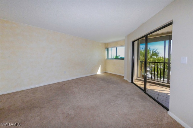 view of carpeted spare room