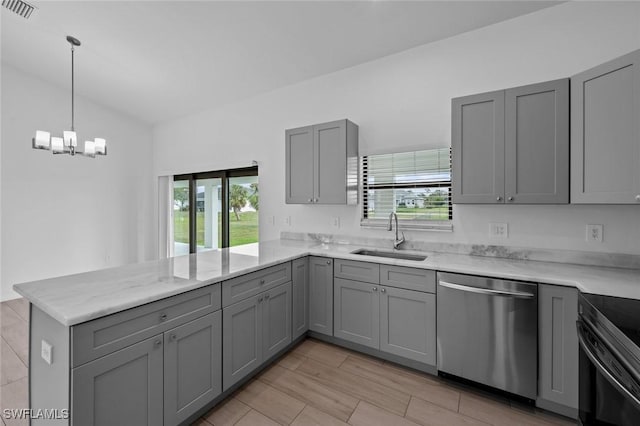 kitchen with gray cabinets, dishwasher, sink, and kitchen peninsula