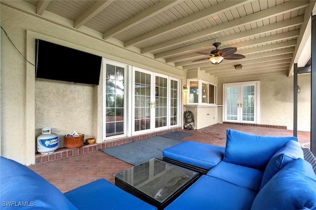 view of patio / terrace featuring an outdoor hangout area, ceiling fan, and french doors