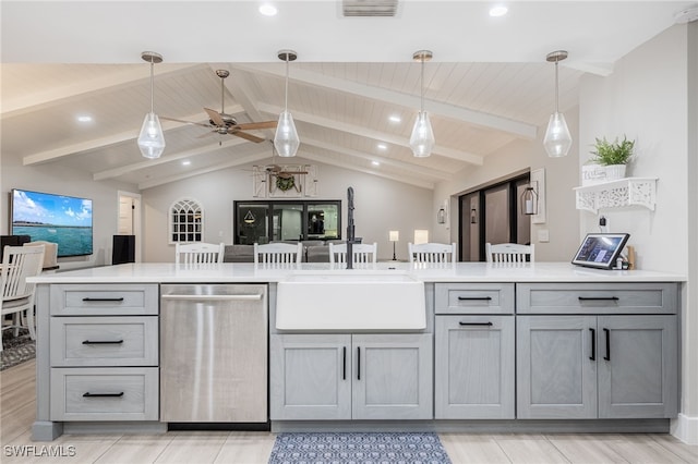 kitchen featuring gray cabinets, lofted ceiling with beams, stainless steel dishwasher, and decorative light fixtures