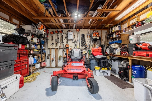 garage with a workshop area