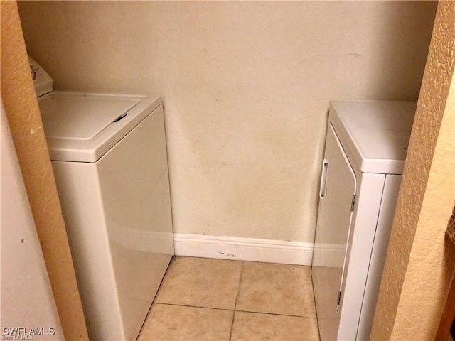 laundry room with light tile patterned floors