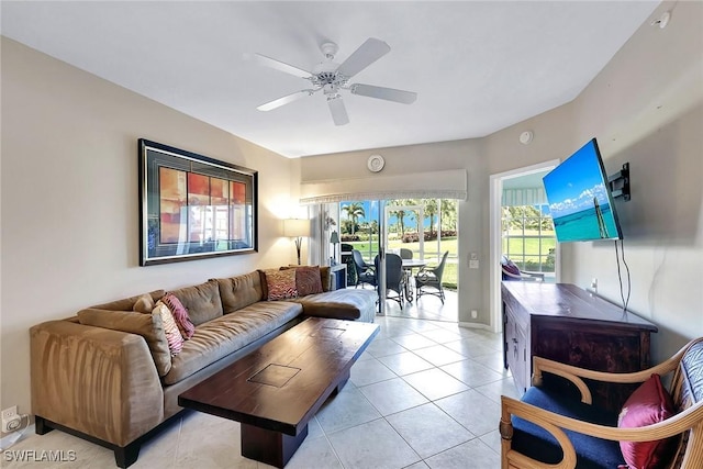 tiled living room featuring ceiling fan