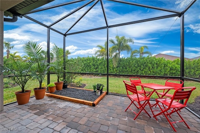 sunroom / solarium featuring a healthy amount of sunlight