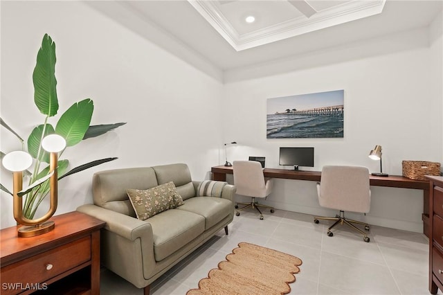 office featuring crown molding, a tray ceiling, light tile patterned flooring, and built in desk