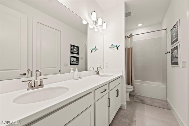 full bathroom with shower / bath combination with curtain, vanity, toilet, and tile patterned flooring