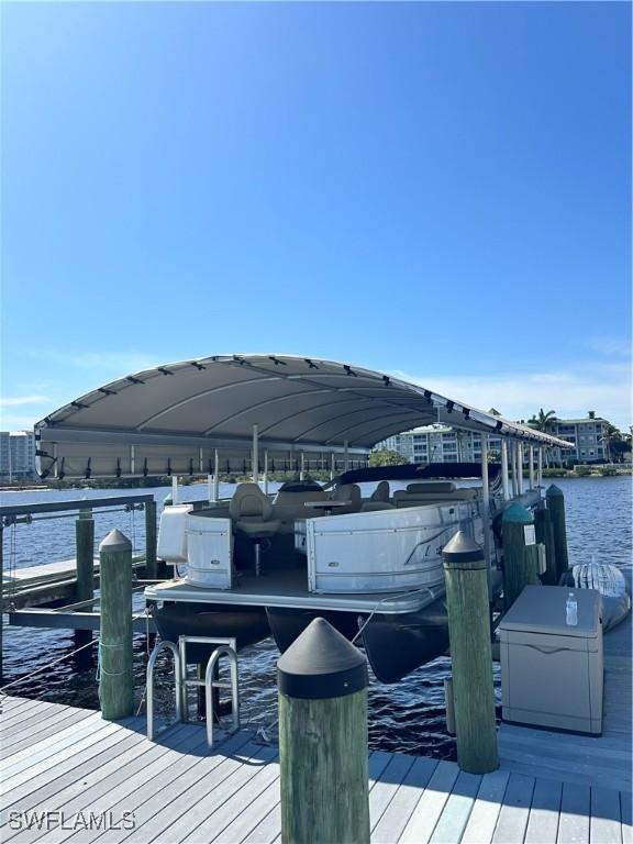 dock area featuring a water view