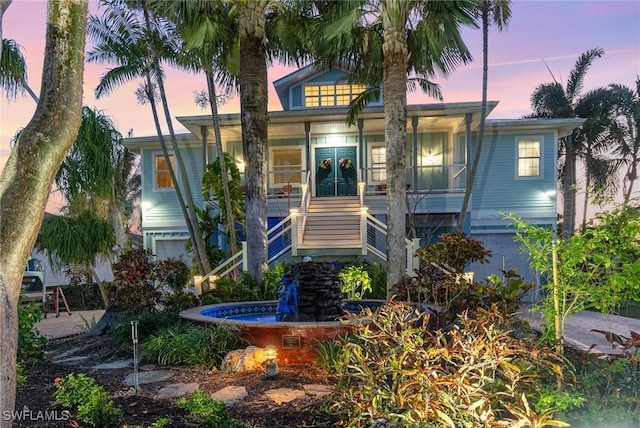 view of front of property with a garage