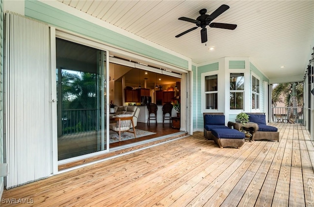 wooden terrace with ceiling fan