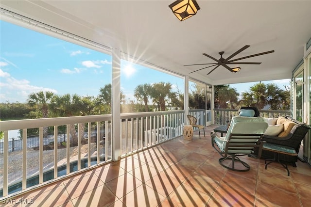 wooden terrace featuring ceiling fan