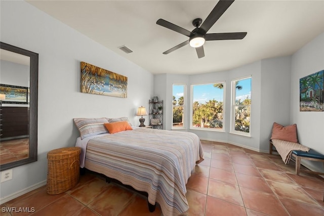 bedroom featuring ceiling fan and light tile patterned flooring