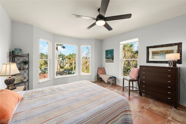 bedroom featuring ceiling fan and light tile patterned floors