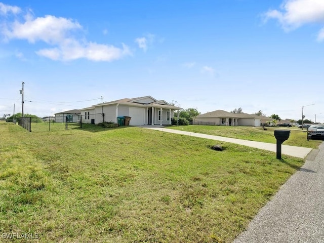 view of front of home with a front yard