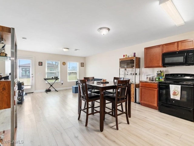 dining area featuring light hardwood / wood-style floors