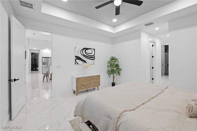 bedroom featuring visible vents, a tray ceiling, recessed lighting, stainless steel fridge with ice dispenser, and marble finish floor