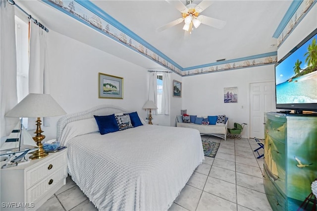 tiled bedroom with ceiling fan