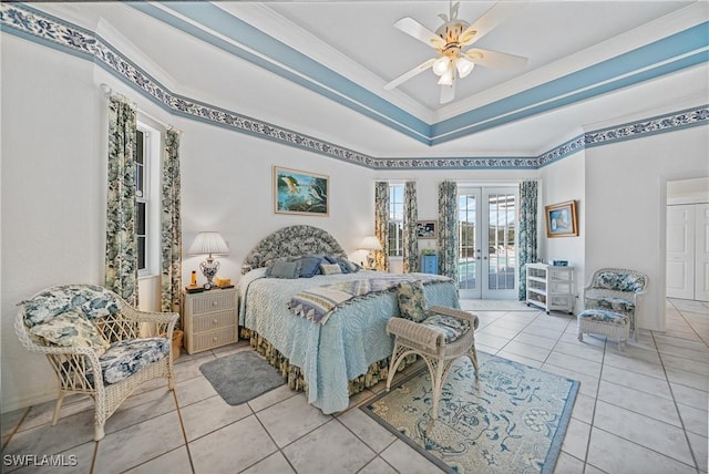 bedroom with light tile patterned flooring, access to exterior, a raised ceiling, crown molding, and french doors