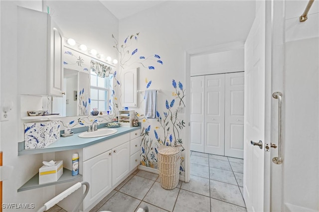 bathroom with vanity and tile patterned floors