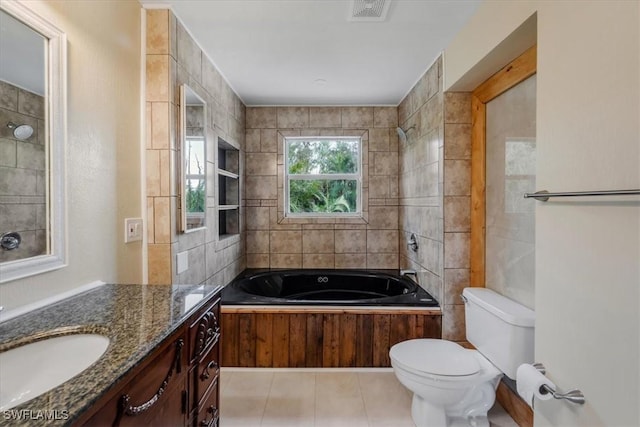 full bathroom with tiled shower / bath combo, vanity, tile patterned flooring, and toilet