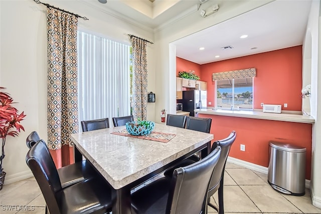 dining room with light tile patterned floors