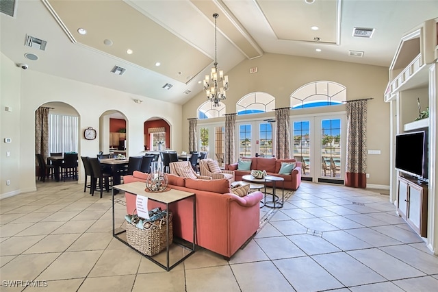 living room with light tile patterned floors, beamed ceiling, high vaulted ceiling, and a chandelier