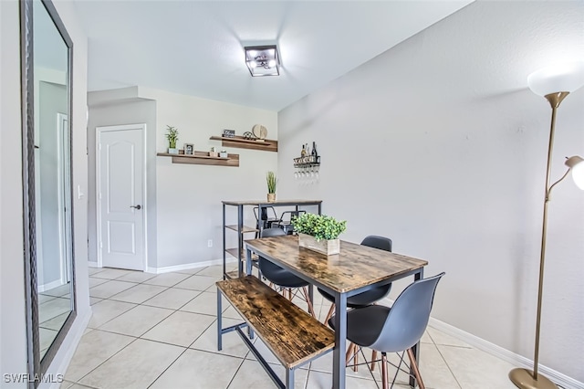 view of tiled dining space