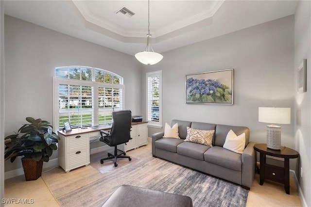 office area with crown molding, light tile patterned floors, and a tray ceiling