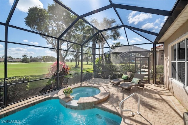 view of swimming pool with a patio, glass enclosure, and an in ground hot tub