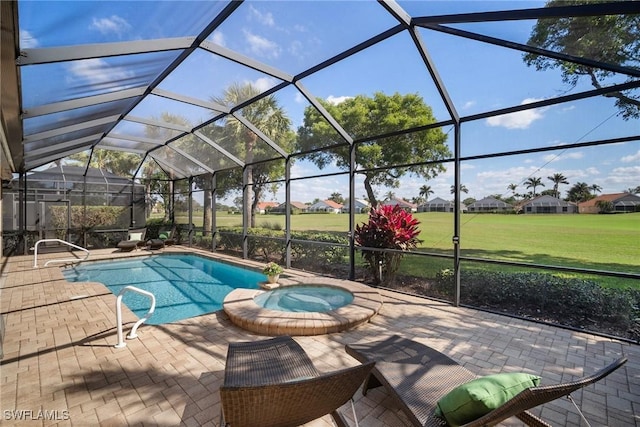 view of swimming pool with an in ground hot tub, a yard, a lanai, and a patio