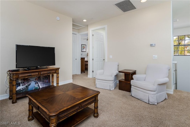 living room with light carpet, baseboards, visible vents, and recessed lighting