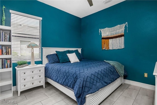 bedroom featuring ceiling fan