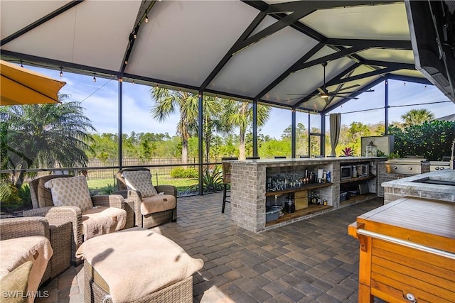 view of patio featuring a gazebo, area for grilling, and an outdoor living space