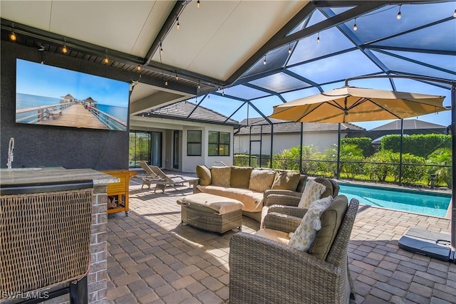 view of patio / terrace with a lanai and outdoor lounge area