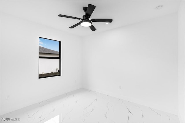 unfurnished room with ceiling fan