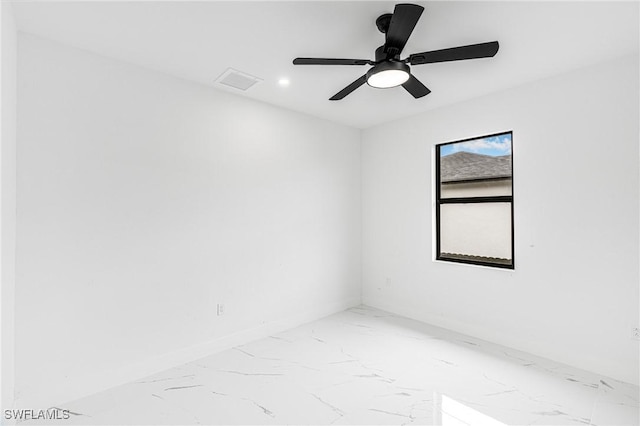 unfurnished room with ceiling fan